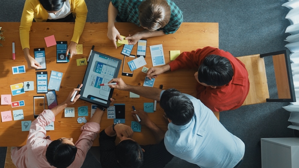 Top,View,Of,Software,Developer,Team,Looking,Ux,Ui,Design